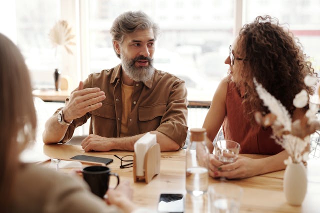 People talking at table